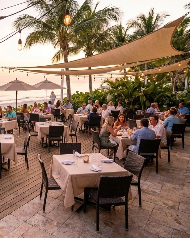 Outdoor patio restaurant with beach scene